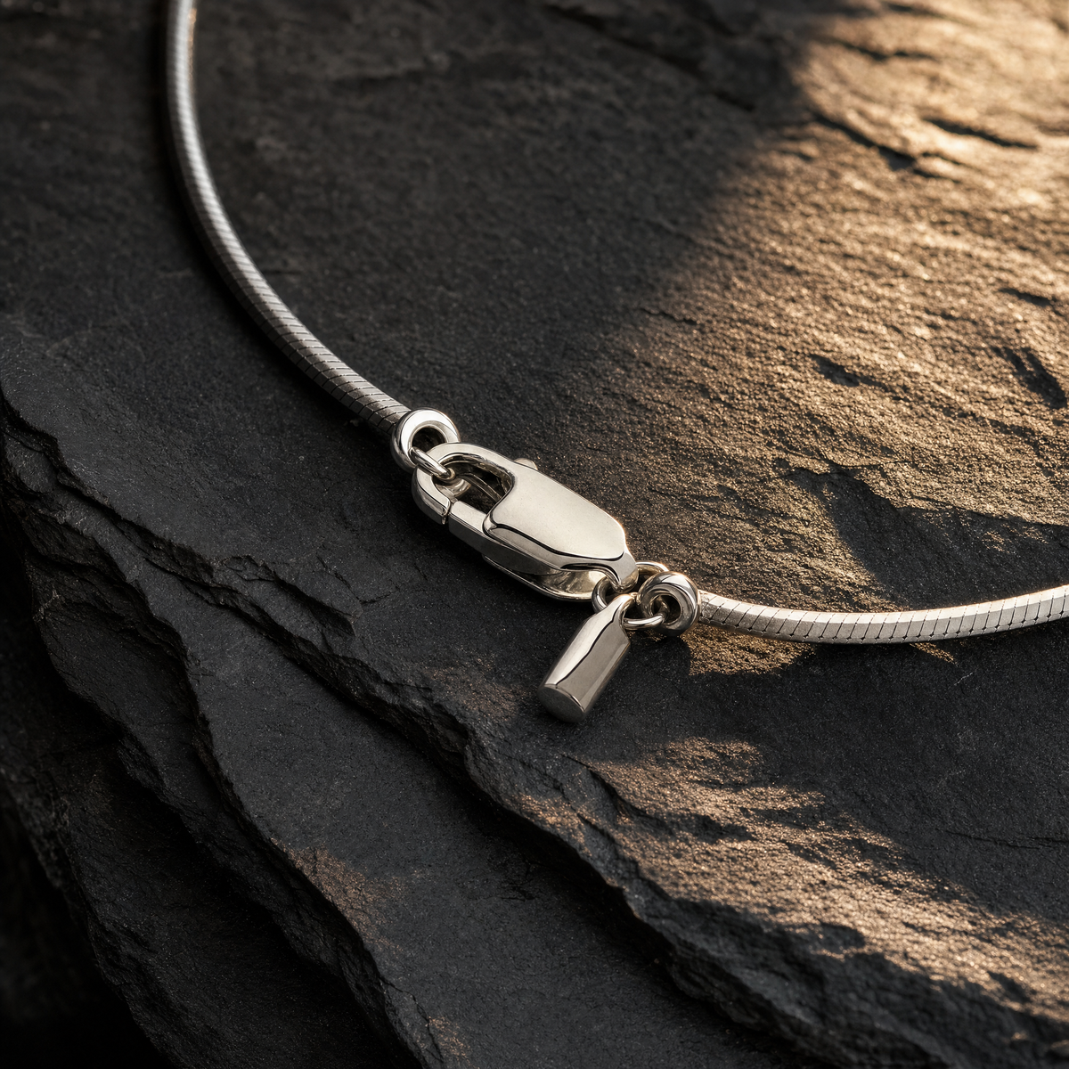 Polished Serpentine Chain 1.2 MM – men's silver-tone snake chain with lobster clasp and tag